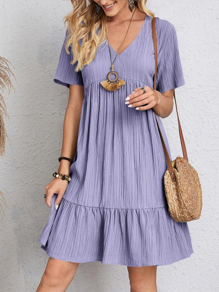 Versatile short sleeve midi dress for women, elegant with flattering belly coverage, great for spring/summer.