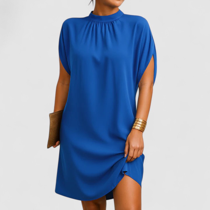 Versatile women's pink mock neck midi dress featuring stylish batwing & split sleeves. Casual or elegant.