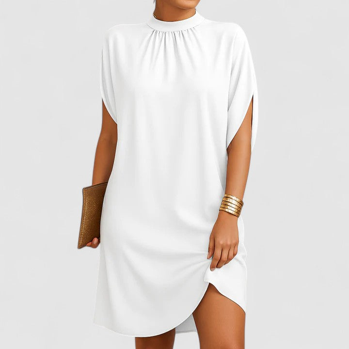 Chic women's white mock neck midi dress, featuring dramatic batwing and split sleeves. Elegant and comfortable.