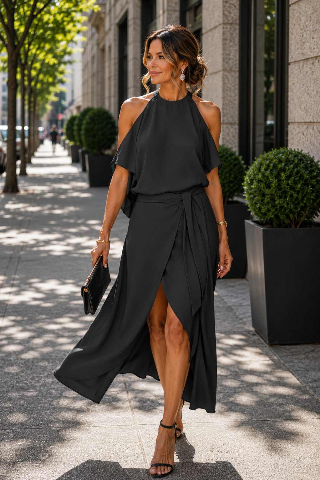 Elegant black off-shoulder midi dress for women, with a sophisticated asymmetrical hem. Perfect for evening & party wear.