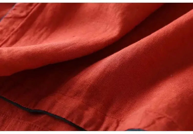 Embroidered women's patterned blouse, relaxed fit, V-neck. Chic & comfortable versatile top.