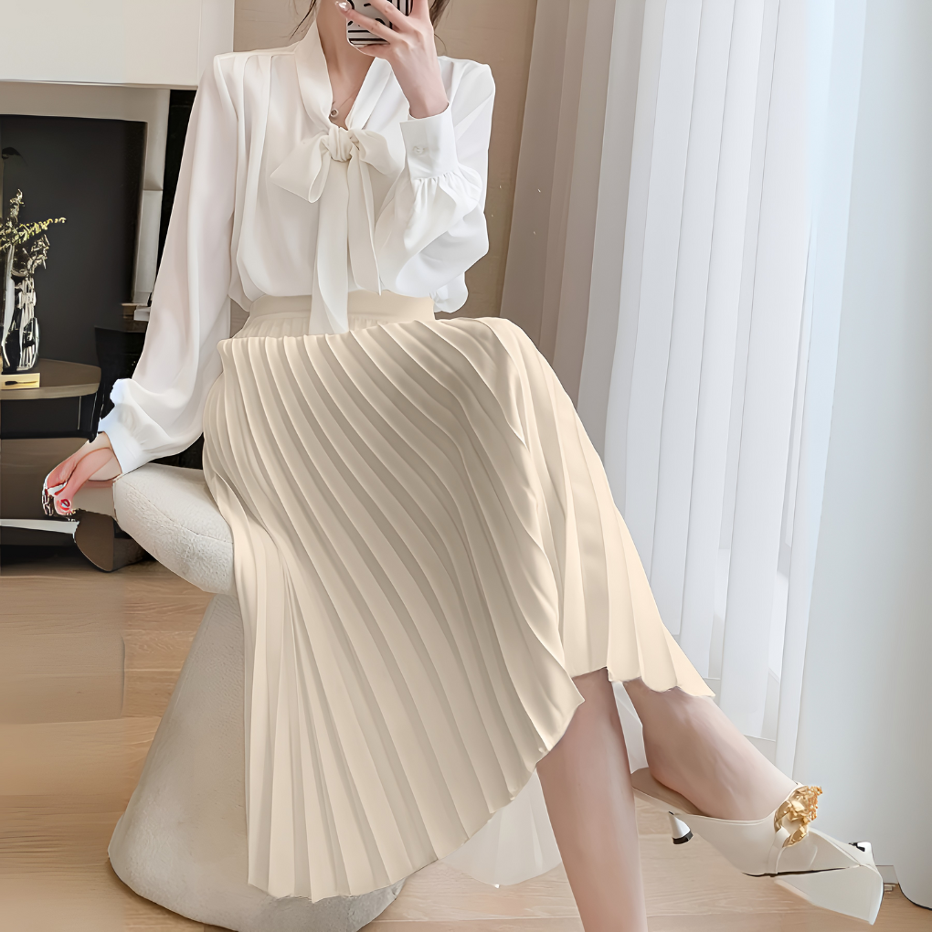 Versatile women's pleated high-waist midi skirt, easily transitioning from day to night elegance.