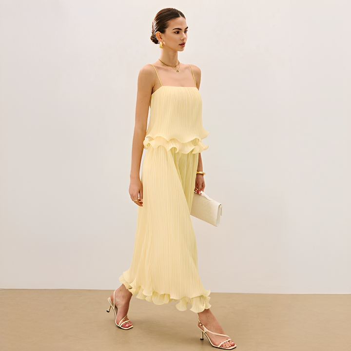 Women's elegant pleated maxi co-ord set with stylish ruffle details, perfect for spring and summer occasions.