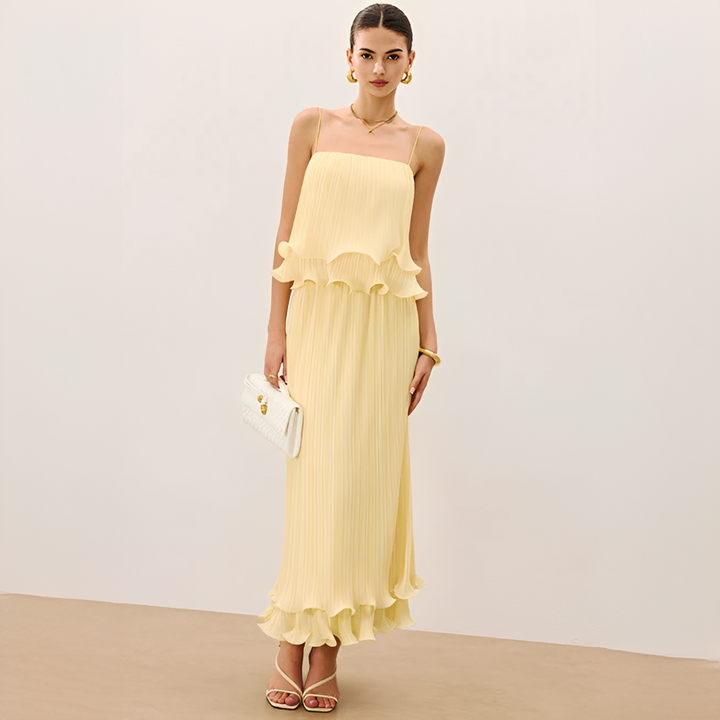 Chic women's two-piece pleated maxi co-ord set with delicate ruffles. Ideal flowing silhouette for parties.