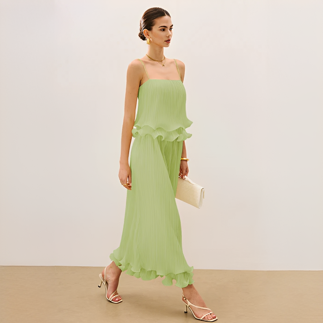 Stylish women's spring/summer pleated maxi co-ord set. Features elegant ruffles and a comfortable, flowing design.