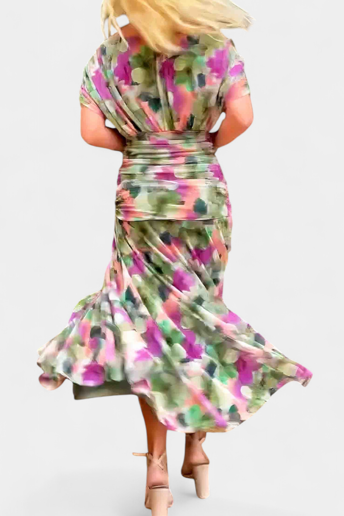 Pleated maxi dress for women, sophisticated wedding guest or formal event attire.