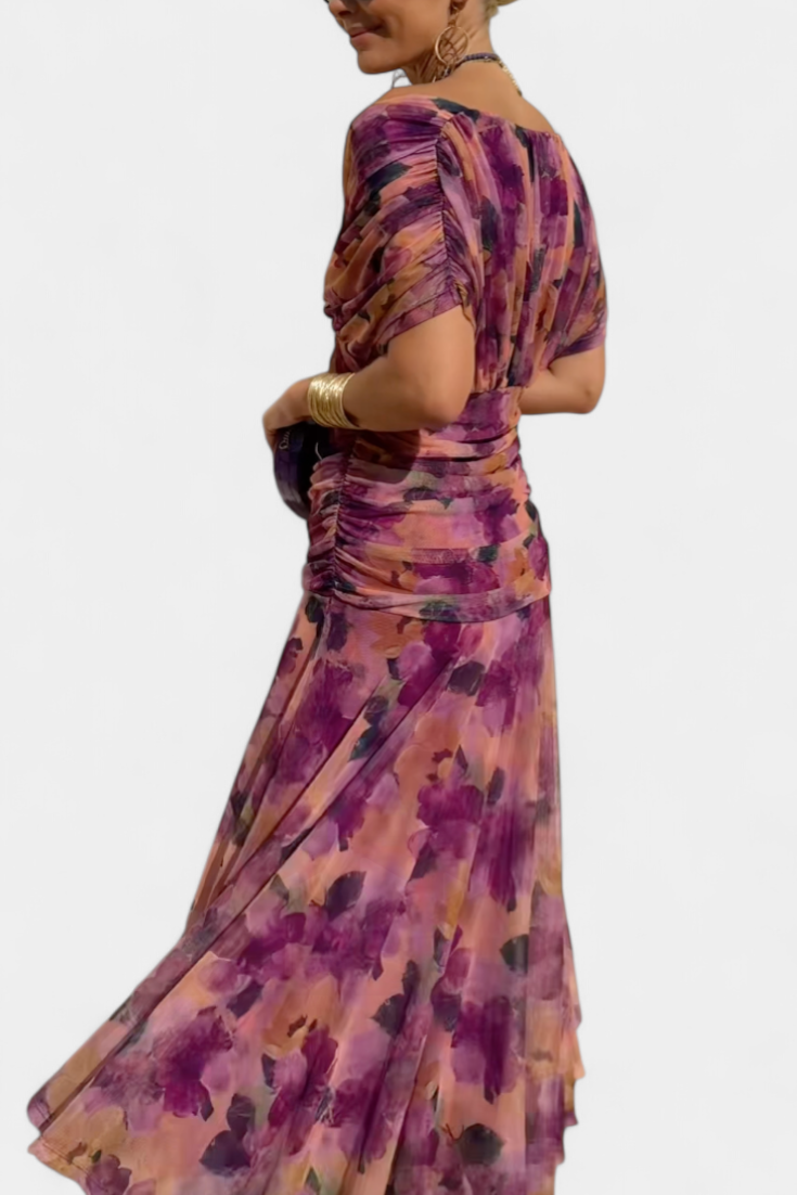 Women's party maxi dress, sleeveless with a V-neck and elegant pleated waist detail.