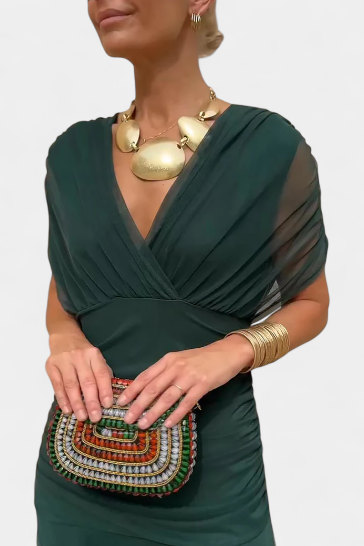 Sleeveless V-neck pleated maxi dress, sophisticated evening gown for women.
