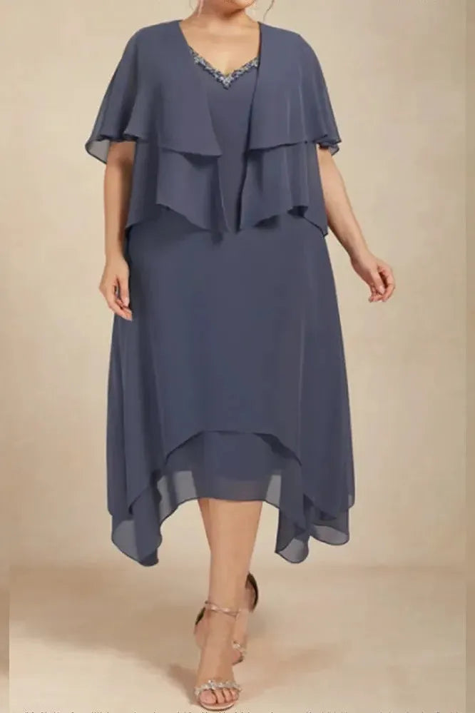 Women's elegant printed flowy midi dress. Perfect for spring & summer, offering effortless style & comfort.