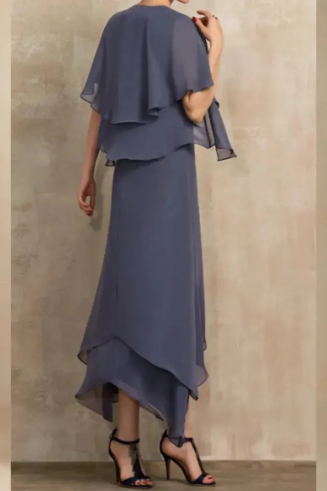 Vibrant printed women's flowy midi dress with relaxed fit. A comfortable and feminine choice for day or party.