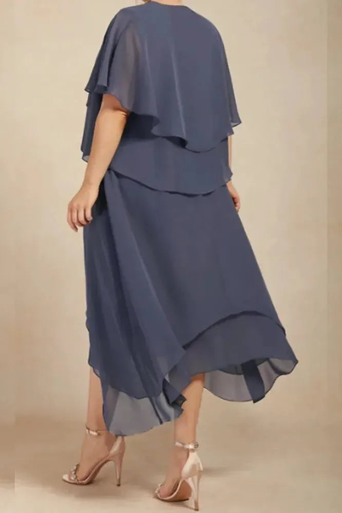 Casual yet chic women's printed flowy midi dress. Ideal for summer fashion, providing comfort and relaxed style.