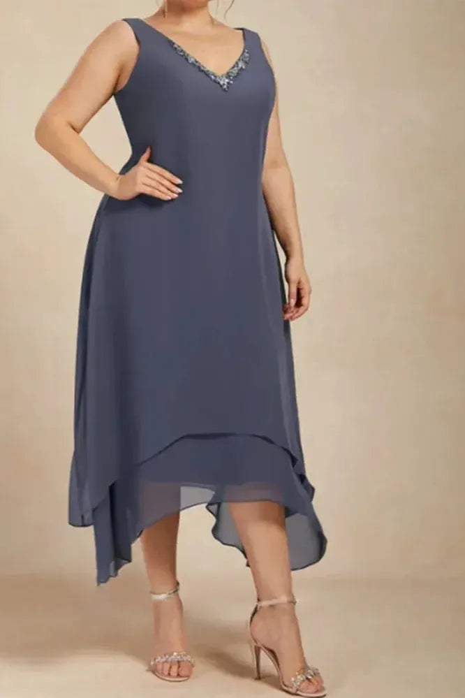Stylish women's printed flowy midi dress. An elegant option for spring events, offering comfort and freedom.
