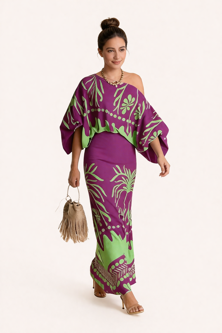 Relaxed fit two-piece women's set with a vibrant printed blouse & flowy maxi skirt for stylish summer wear.