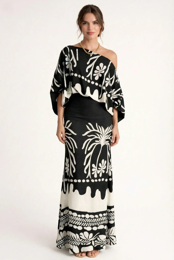 Chic purple women's co-ord set: printed blouse & long maxi skirt. Ideal elegant summer fashion for outings.
