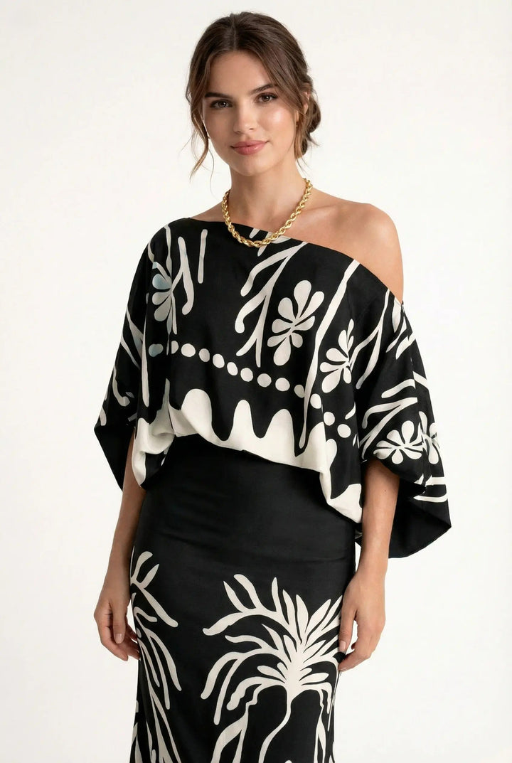 Stylish women's printed summer blouse & comfortable maxi skirt two-piece. A versatile vacation outfit set.