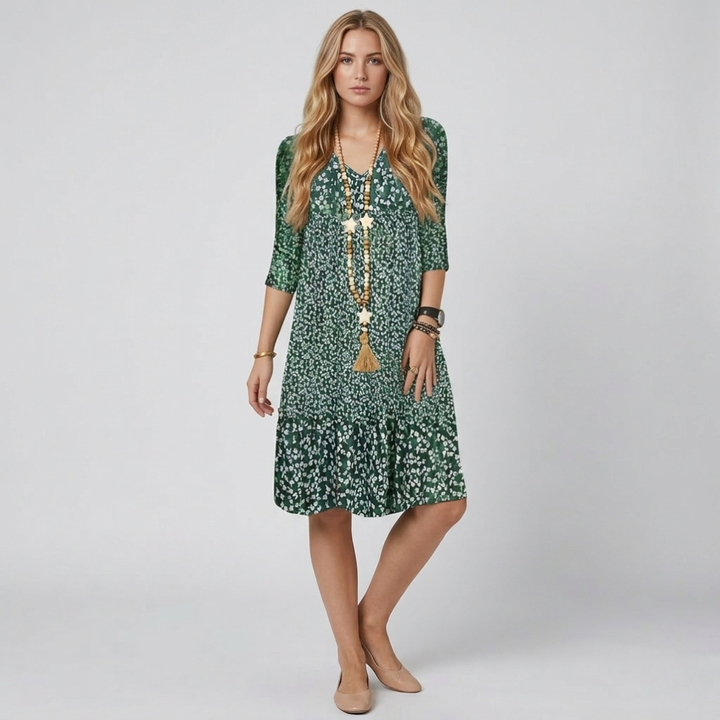 Women's elegant printed midi dress with a V-neck and 3/4 sleeves. Perfect A-line flowy style for spring & summer.