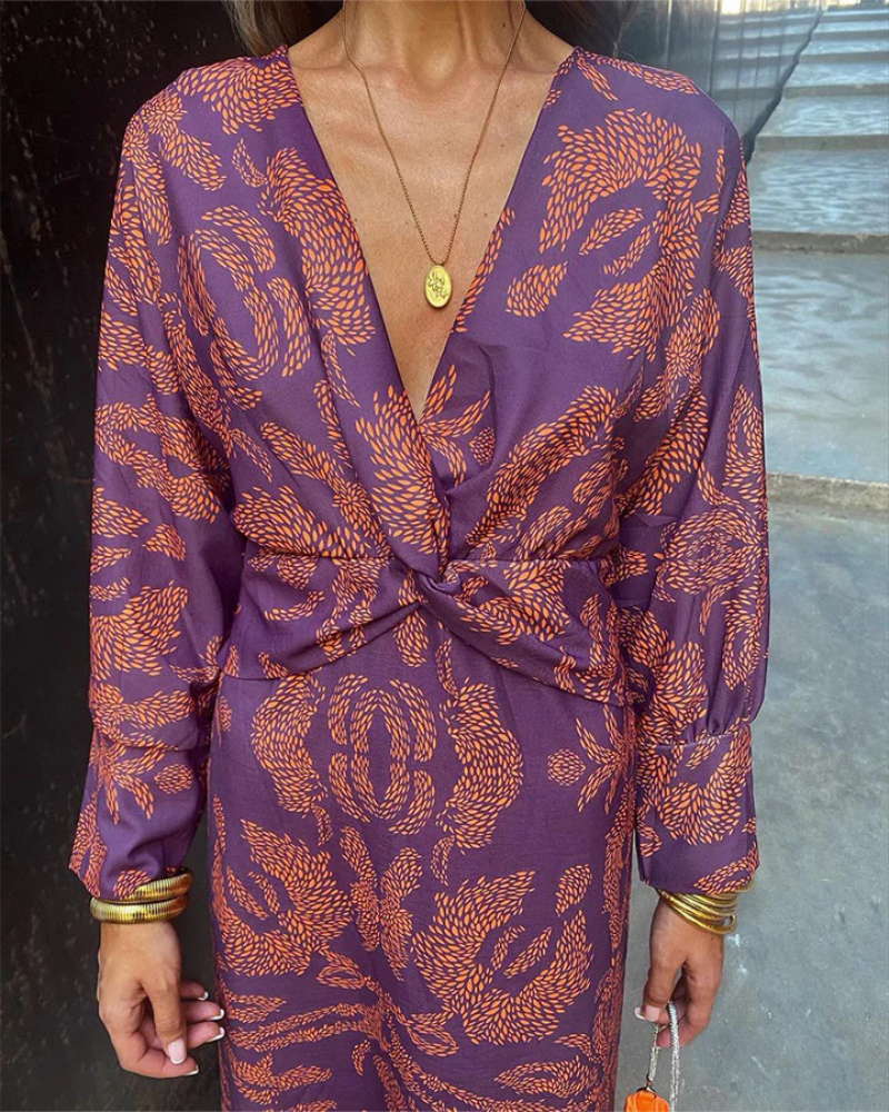 Sophisticated women's long sleeve V-neck printed maxi dress, an elegant choice for evening events.