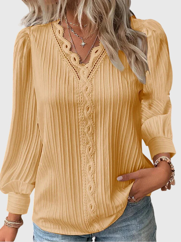 Women's elegant pullover blouse, chic long sleeve top for versatile fashion.