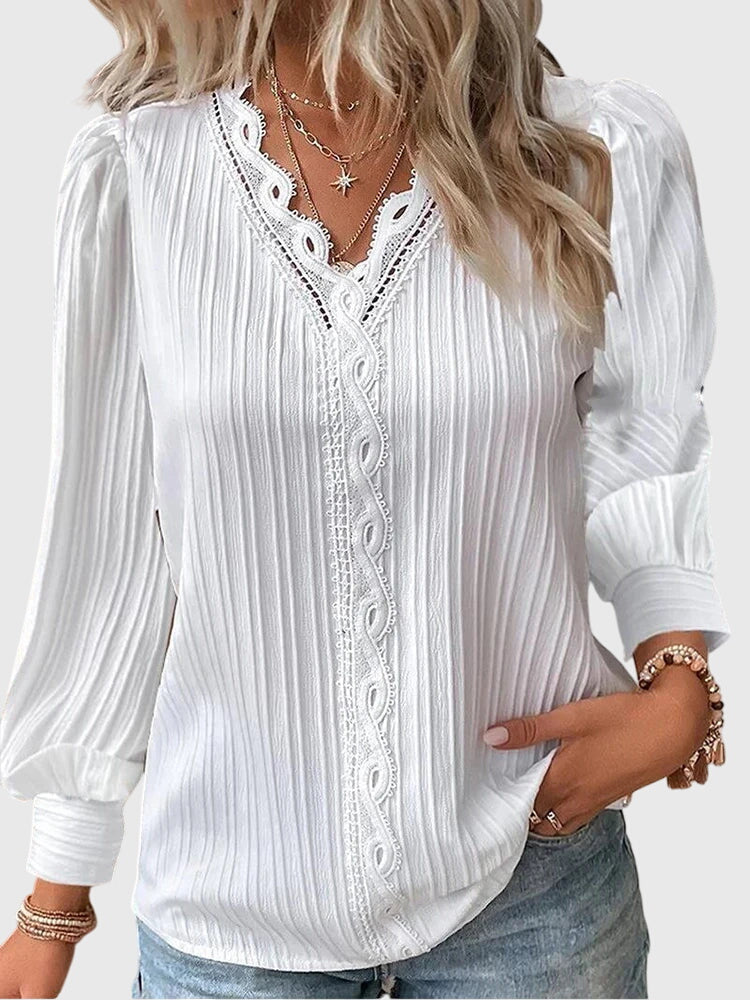 Fashionable women's pullover blouse, elegant long sleeve top for a chic and versatile wardrobe.