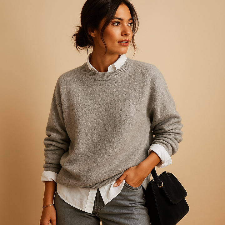 Cozy & elegant women's long-sleeve knit pullover sweater, perfect for comfortable everyday wear, fall & winter style.