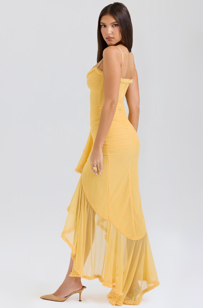 Detailed view of the flattering ruched design on an elegant women's lace dress, suitable for evening wear.