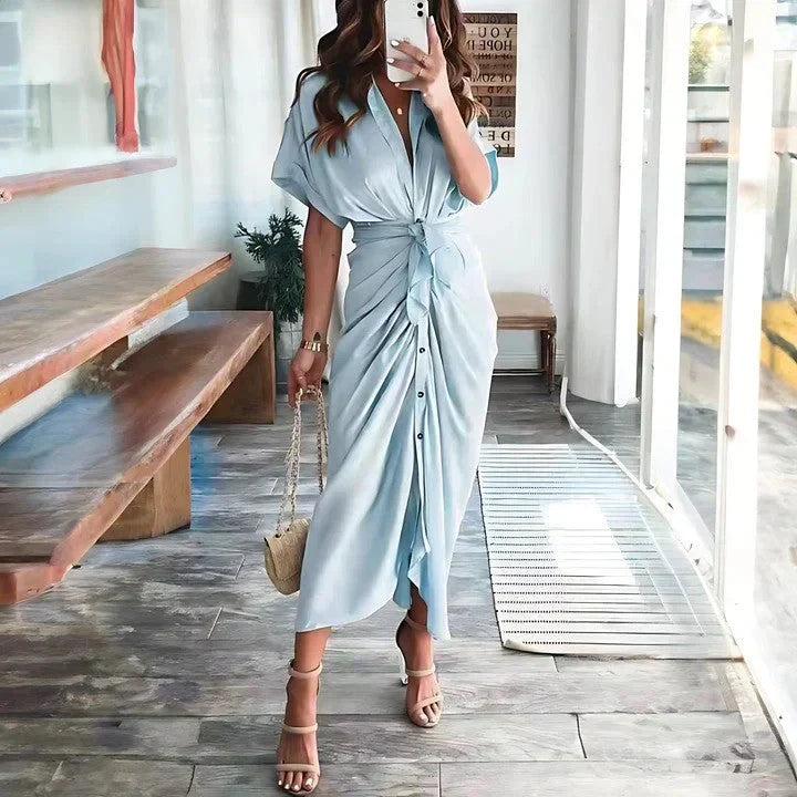 Elegant women's ruched midi dress with tie waist and button front details. Ideal for spring/summer occasions.