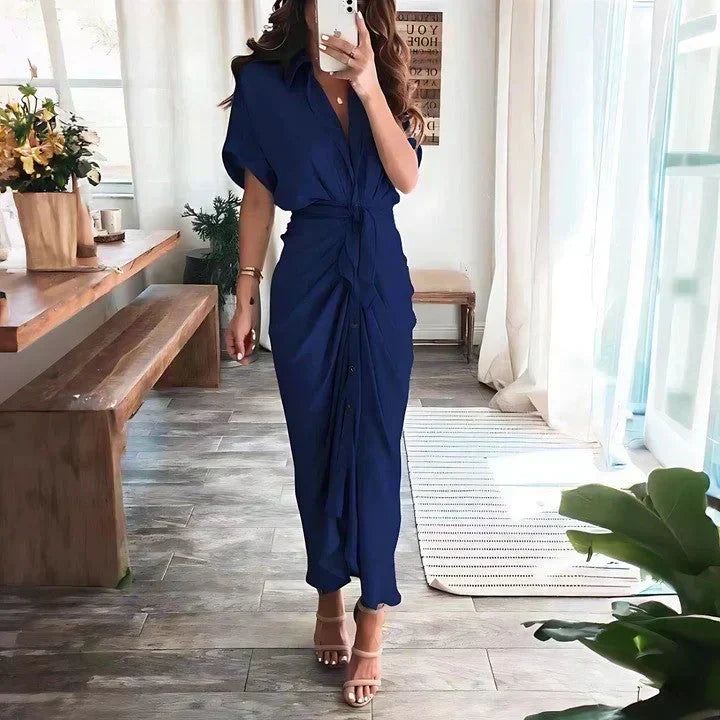 Fashionable women's short sleeve ruched midi dress with tie waist and button front. Perfect for spring fashion.