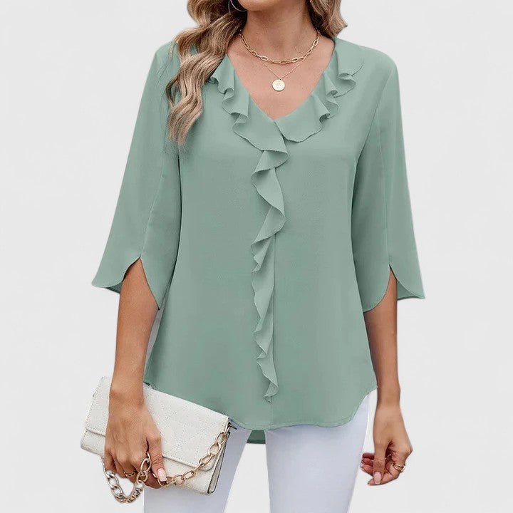 Women's elegant ruffle V-neck blouse with split sleeves, perfect for spring fashion.