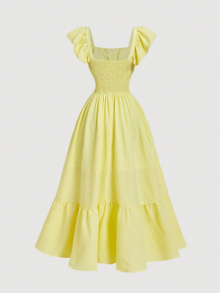 Elegant women's off-shoulder ruffled maxi dress, a perfect choice for summer parties and events.