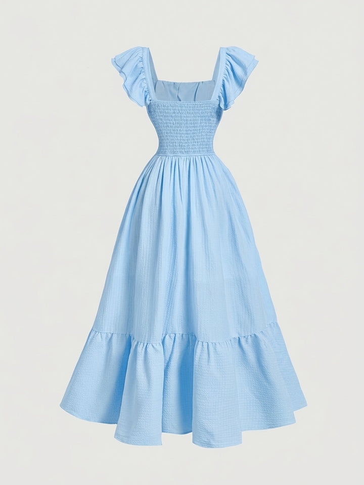 Long women's summer maxi dress, off-shoulder style with elegant ruffles, perfect for special occasions.