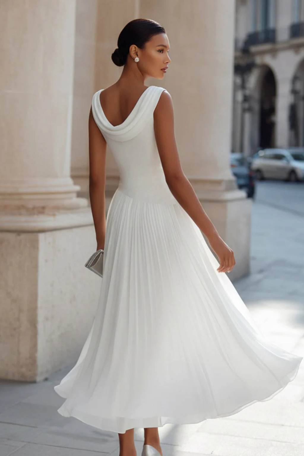Elegant navy sleeveless A-line midi dress for women, with a flowing skirt, chic for summer & formal events.