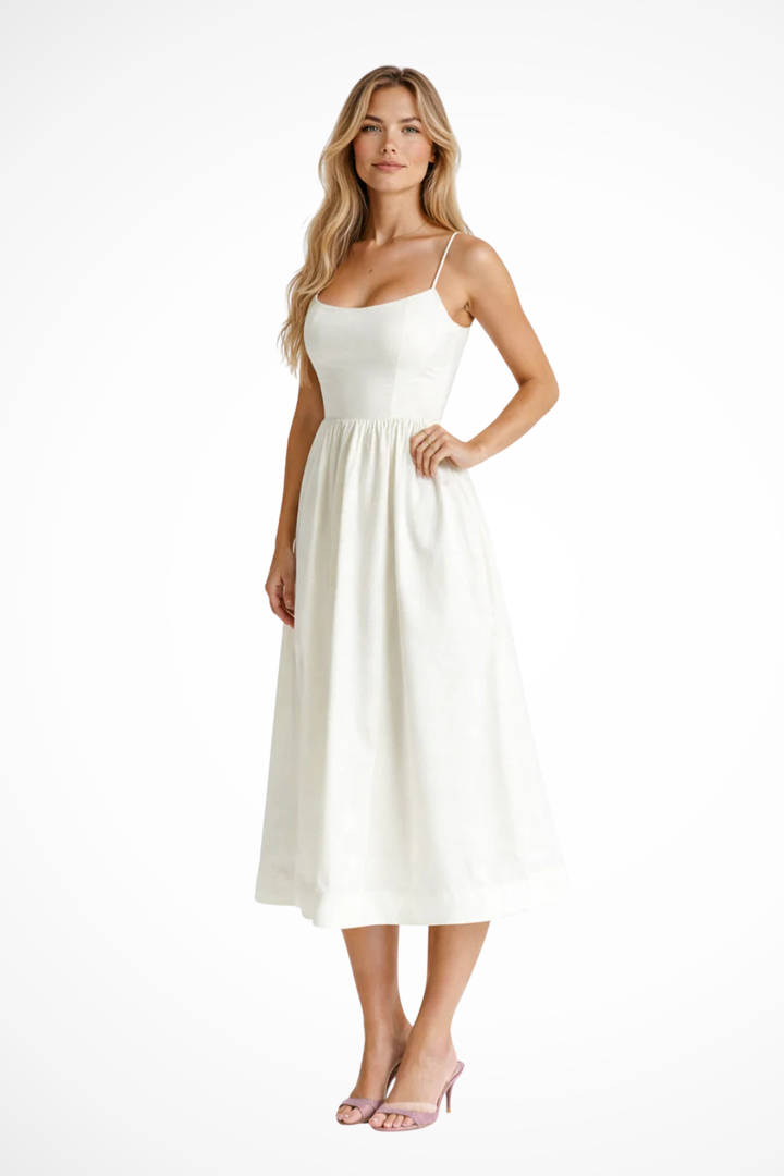 Comfortable women's casual midi dress. Sleeveless spaghetti strap design for summer ease.