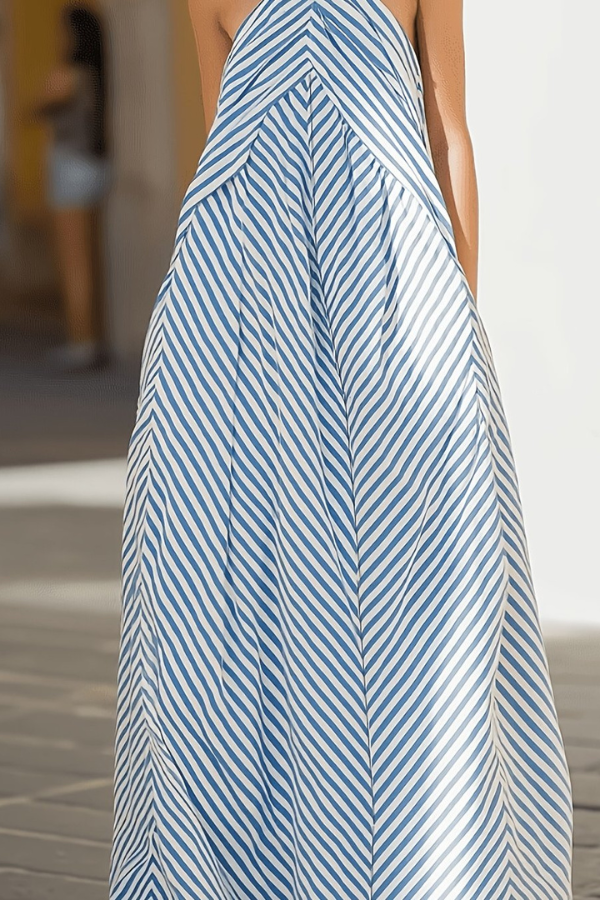 Women's vacation striped halter maxi dress. Chic summer fashion, elegant resort wear, and party dress style.