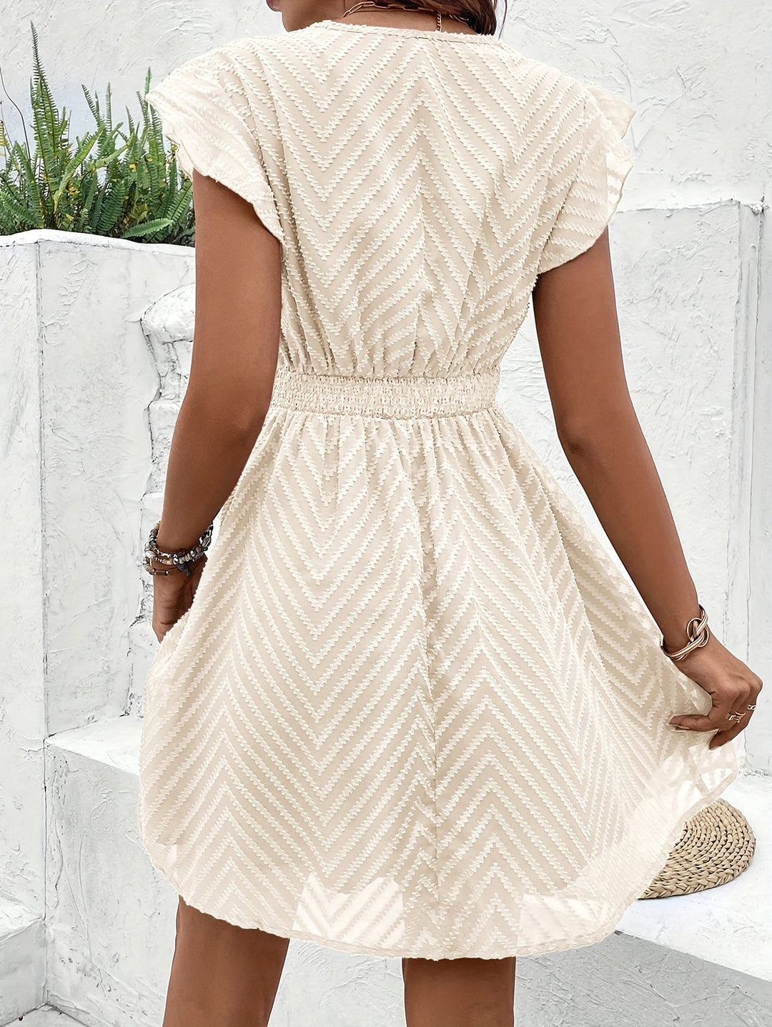 Chic women's summer dress featuring a flattering sweetheart neckline & elegant flared skirt design.