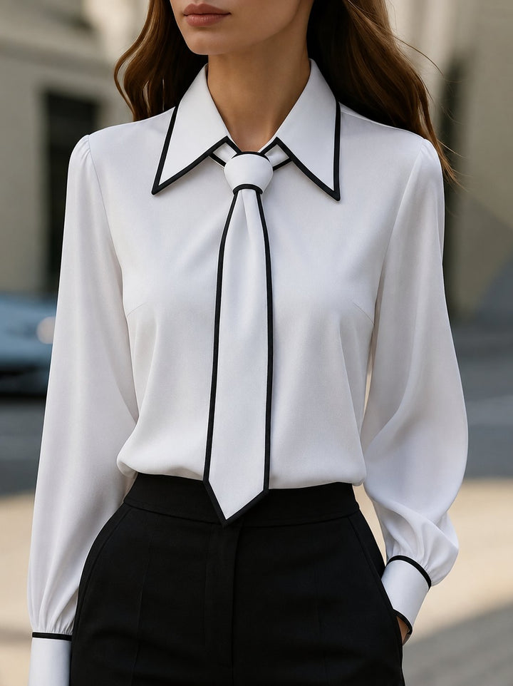 Women's elegant tie neck blouse with long sleeves, contrast trim, and button-down front, perfect for office wear.