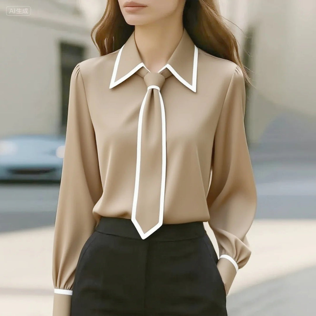 Chic women's tie neck blouse featuring a professional button-down design and stylish contrast trim.