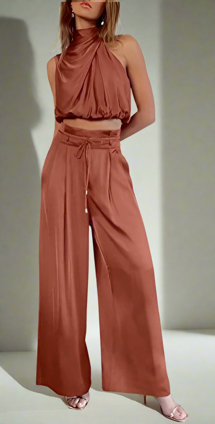 Women's elegant two-piece set in premium cotton linen blend. Versatile outfit with matching blouse & trousers for chic style.