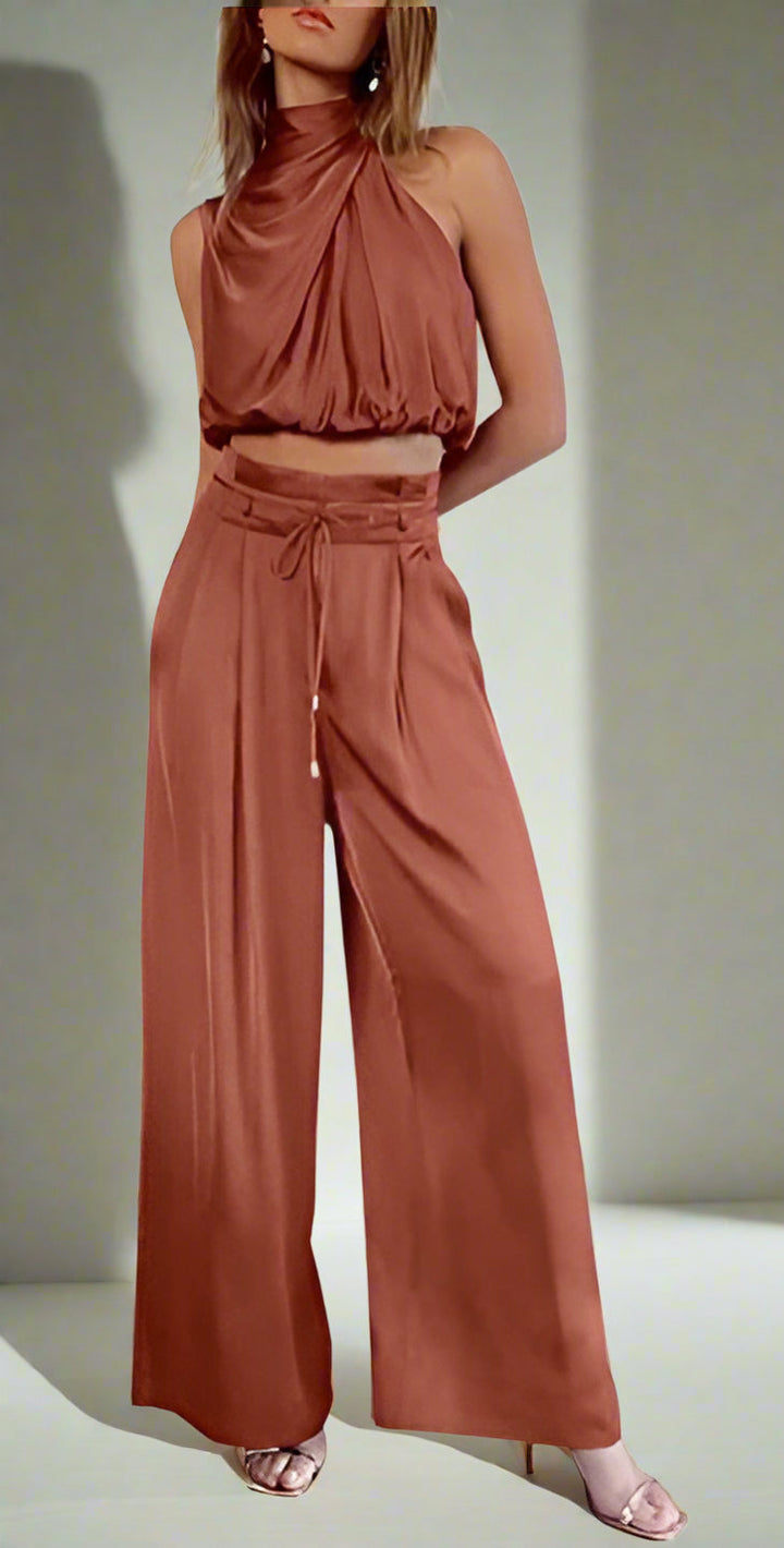 Women's elegant two-piece set in premium cotton linen blend. Versatile outfit with matching blouse & trousers for chic style.