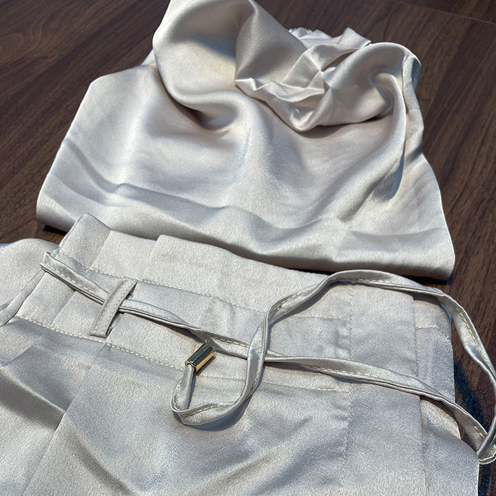 Chic women's two-piece loungewear set with elegant blouse & trousers. Perfect cotton linen blend for stylish comfort.