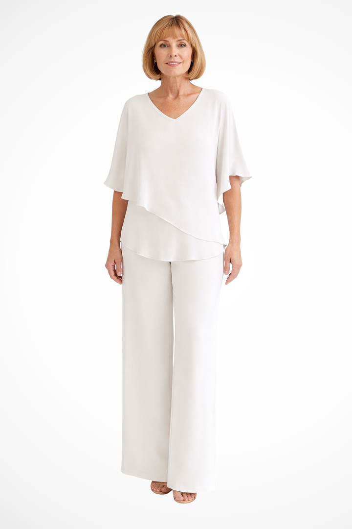 Comfortable & elegant women's two-piece set with a flowing batwing V-neck top and wide leg pants. Casual chic.