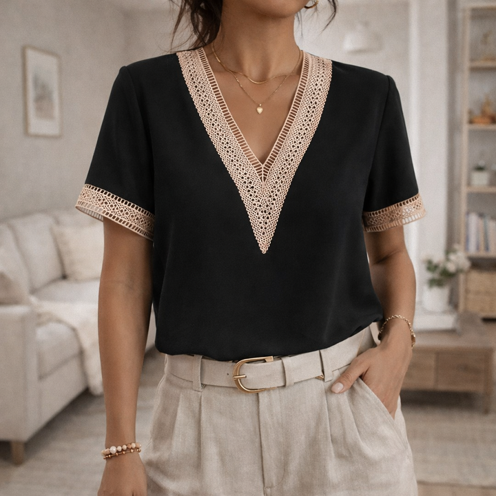 Lightweight women's V-neck blouse with lace trim, perfect for spring fashion & comfortable summer styling.