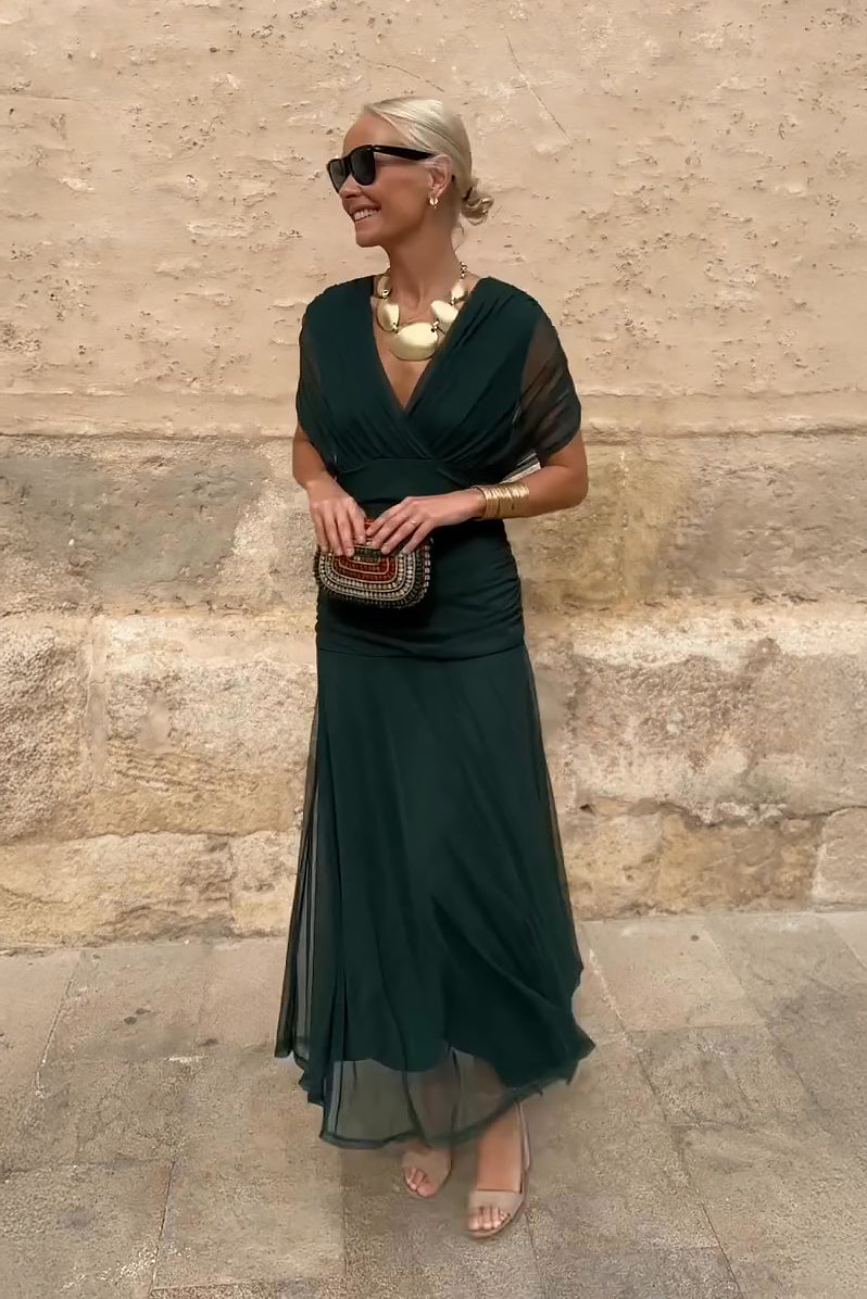 Women's elegant V-neck maxi dress with flutter sleeves & pleated waist. Perfect for formal events.