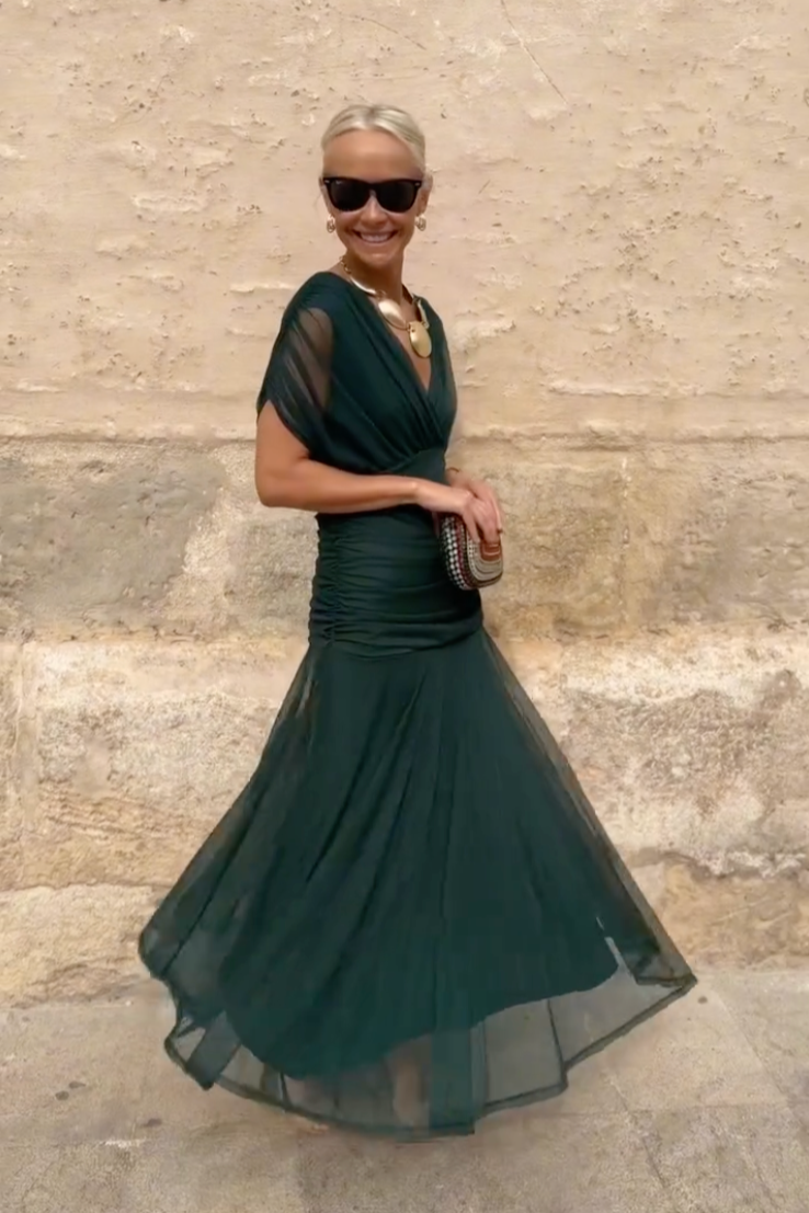 Comfortable flowy women's maxi dress with elegant V-neck and flutter sleeves. Great for warm weather.