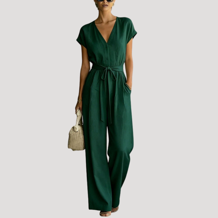 Comfortable women's V-neck wide leg jumpsuit with cap sleeves, ideal for casual or elegant summer outfits.