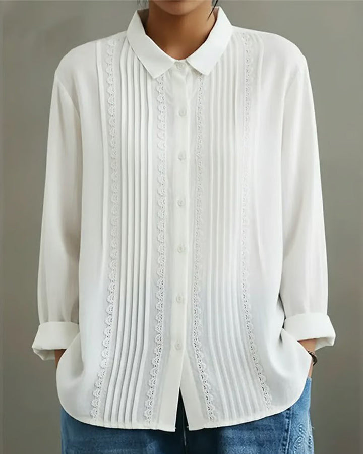 Women's elegant white long sleeve blouse with a stylish doll collar, perfect for office or casual spring wear.