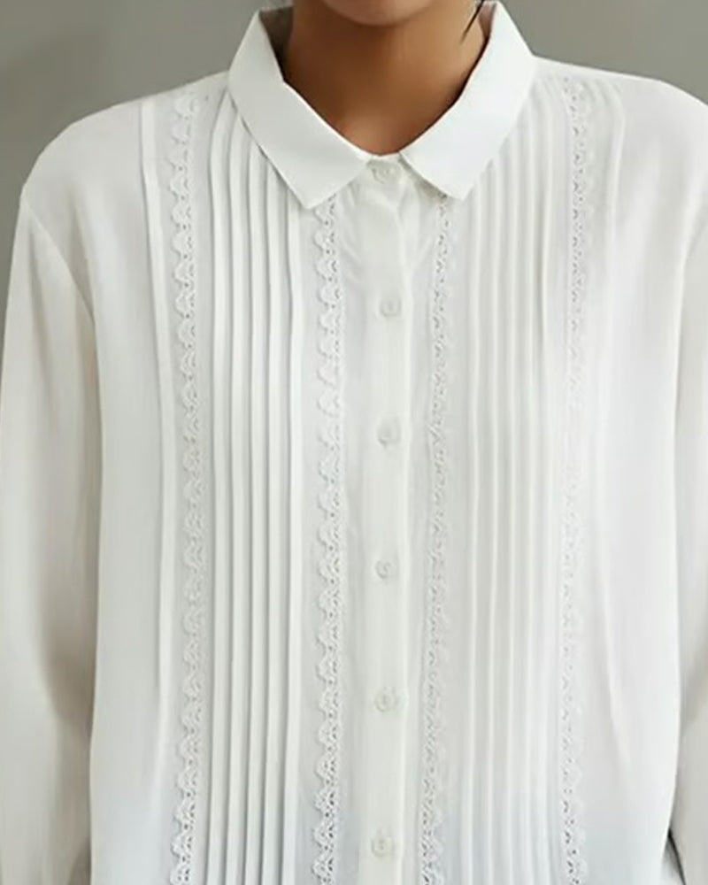 White Peter Pan collar blouse for women, a versatile long sleeve top for elegant office fashion or everyday wear.