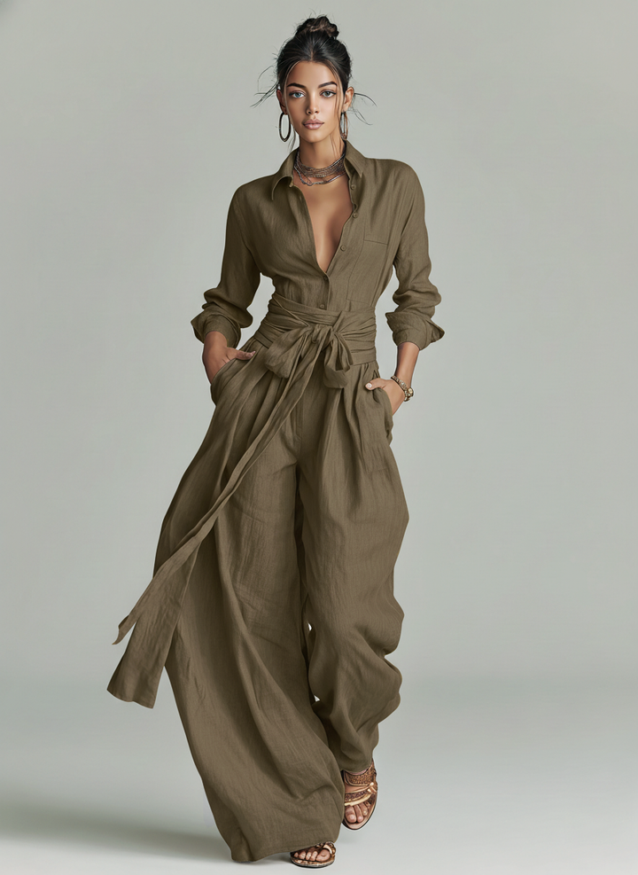 Elegant women's maxi jumpsuit with wide legs & tie waist. Perfect for resort or chic casual wear.
