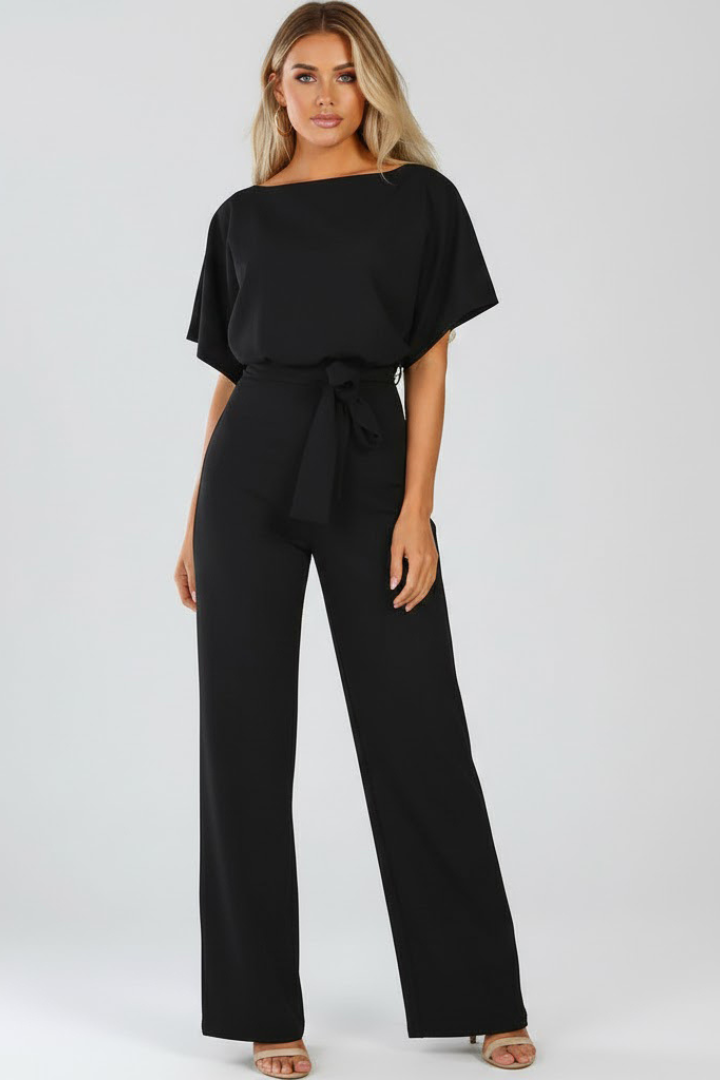 Versatile women's elegant wide leg short sleeve jumpsuit. Features a round neck and a fashionable belt.