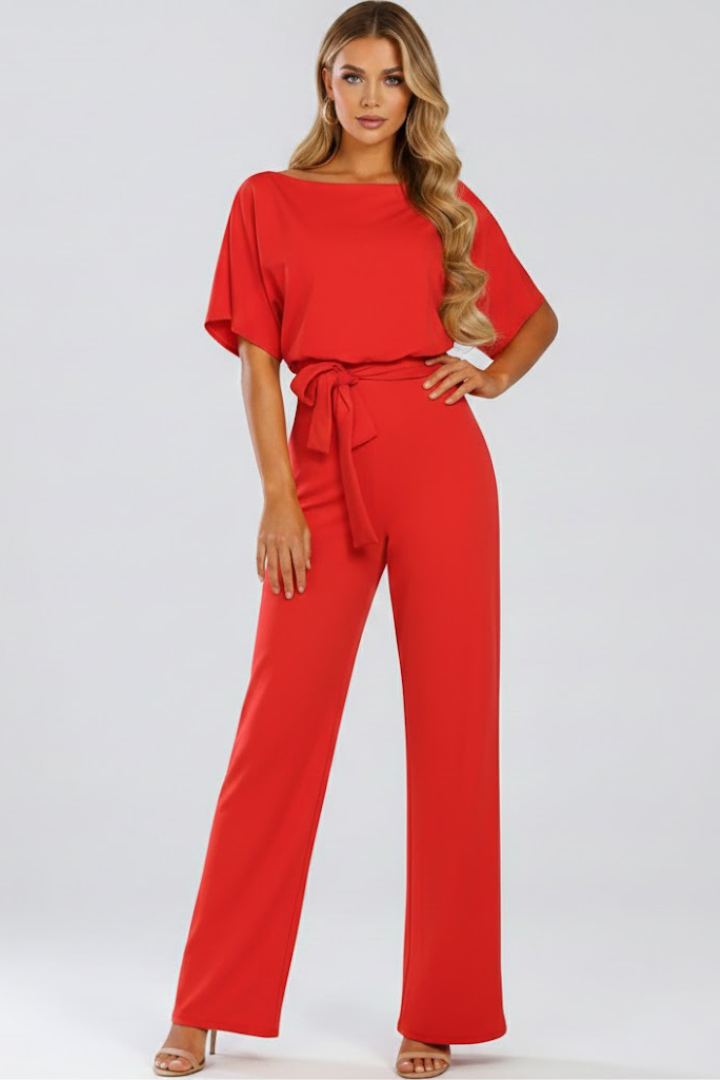 Elegant women's round neck wide leg jumpsuit. Short sleeves and a tie-waist belt create a flattering silhouette.
