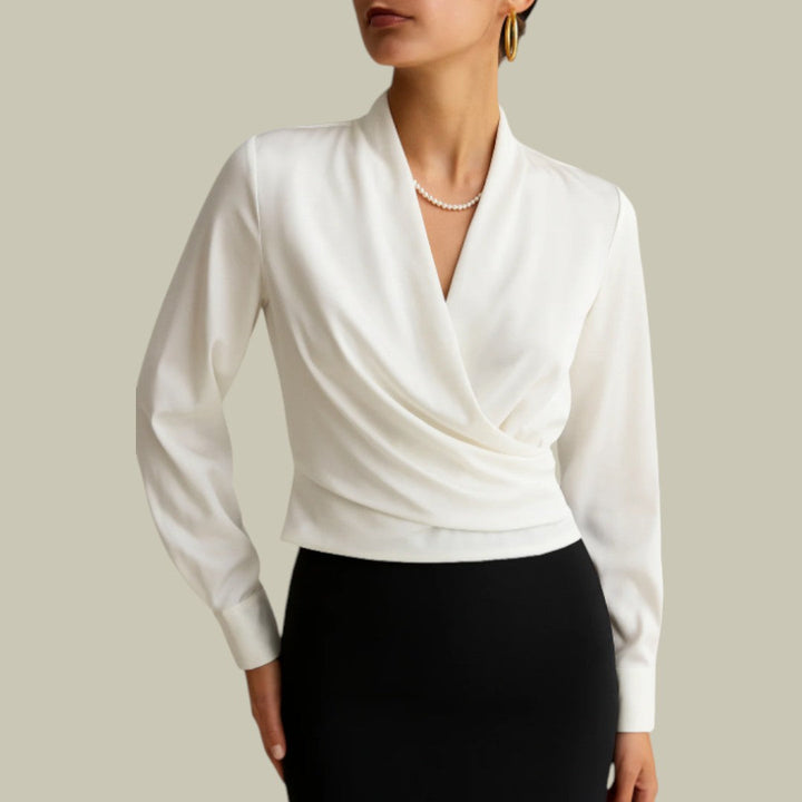 Stylish women's wrap blouse, elegant with a flowing neckline & long sleeves. Ideal for spring fashion & summer office wear.